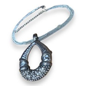 4 silver chains statement necklace with diamonds and adjustable sizing.